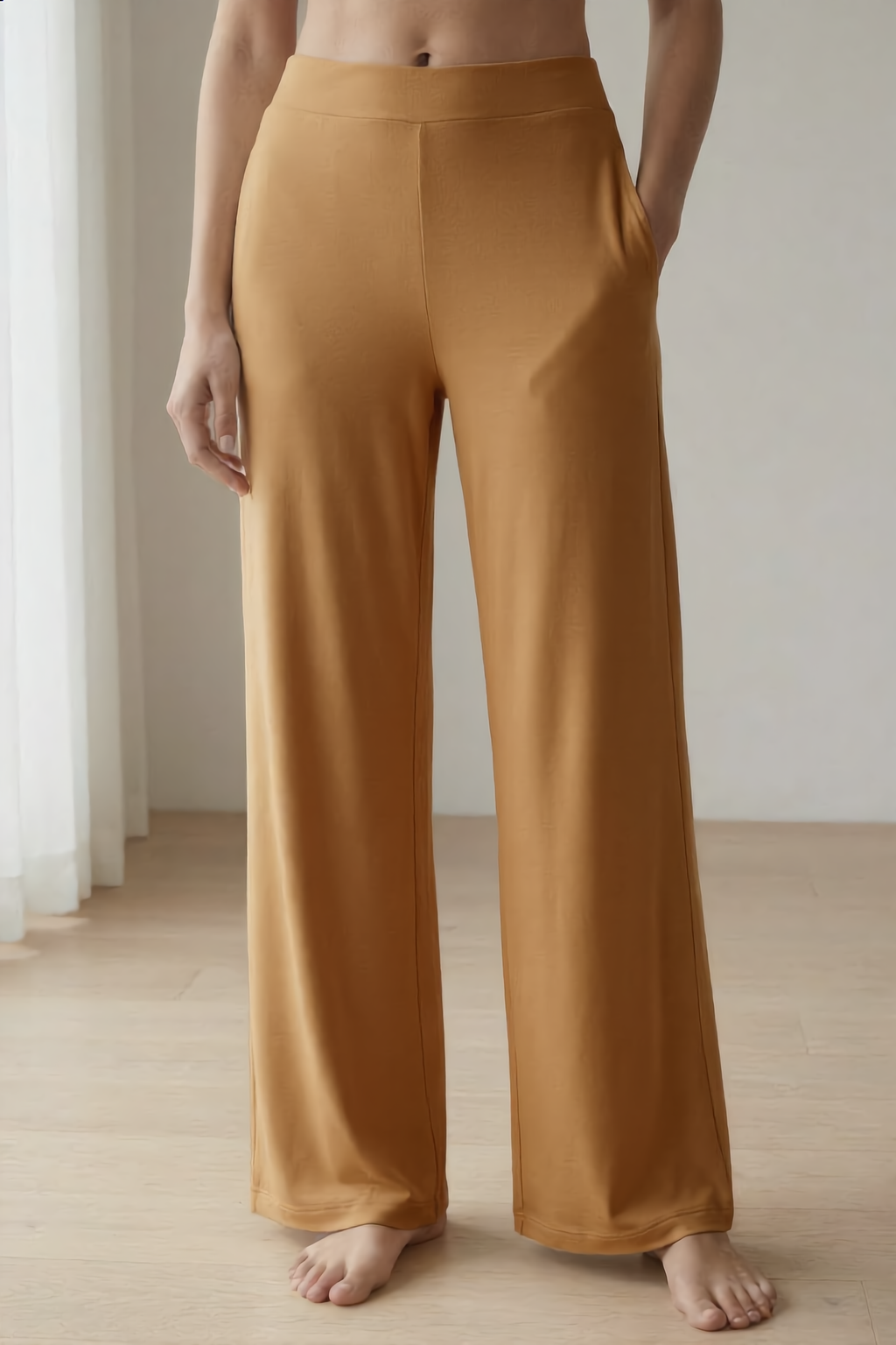 Woman wearing caramel bamboo wide-leg trousers loungewear 