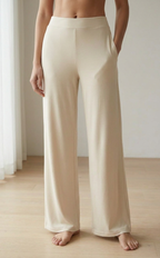 Woman wearing caramel bamboo wide-leg trousers loungewear 