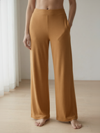 Woman wearing caramel bamboo wide-leg trousers loungewear 